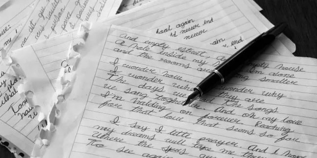 Handwritten manuscript pages being converted into an editable digital document